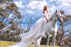 bride riding white horse